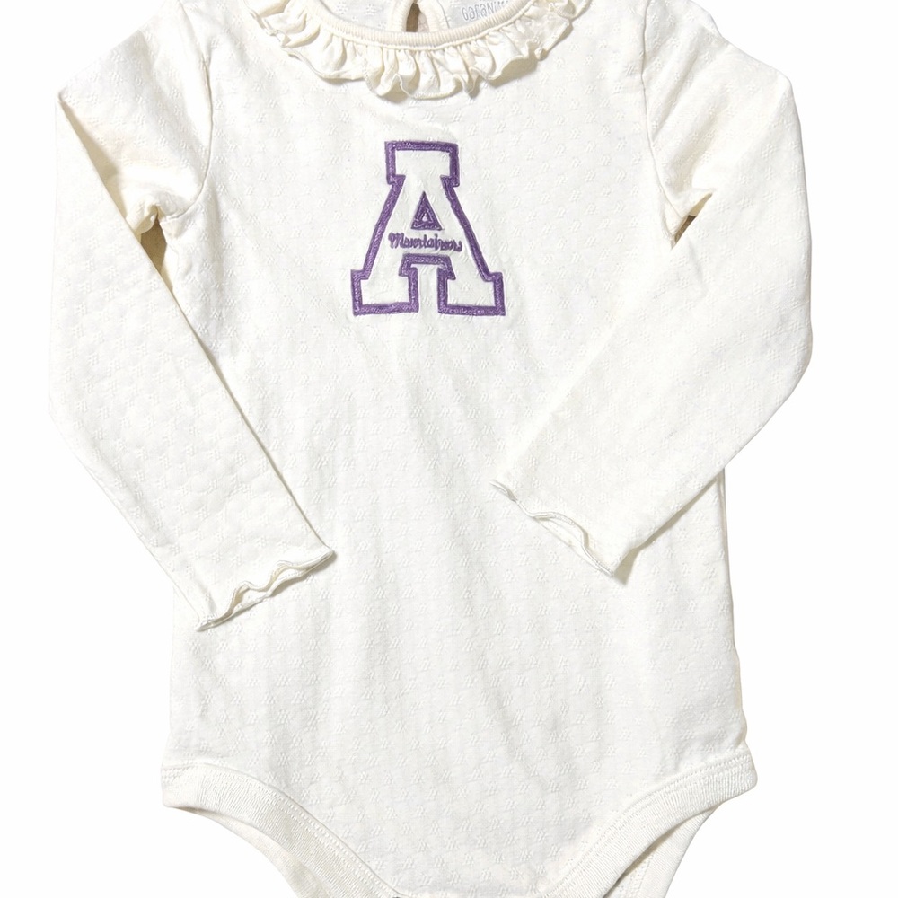 ASU Cream Long Sleeve Baby Onesie with Purple Mountaineers logo.
